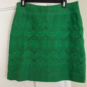 Green linen eyelet miniskirt